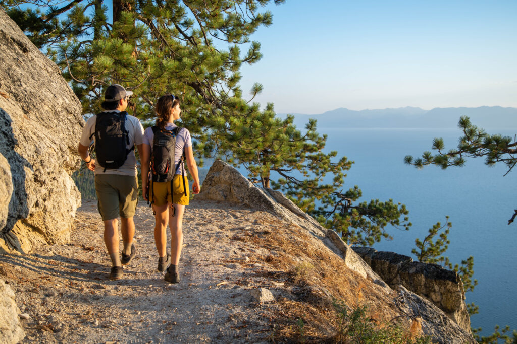 A couple hiking the trails surrounding Lake Tahoe